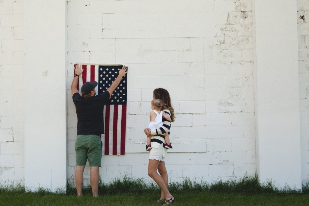 Man Holding U.s. Flag